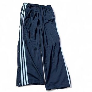 Vintage Adidas Men's Black sweatpants with buttons from top to bottom on sides